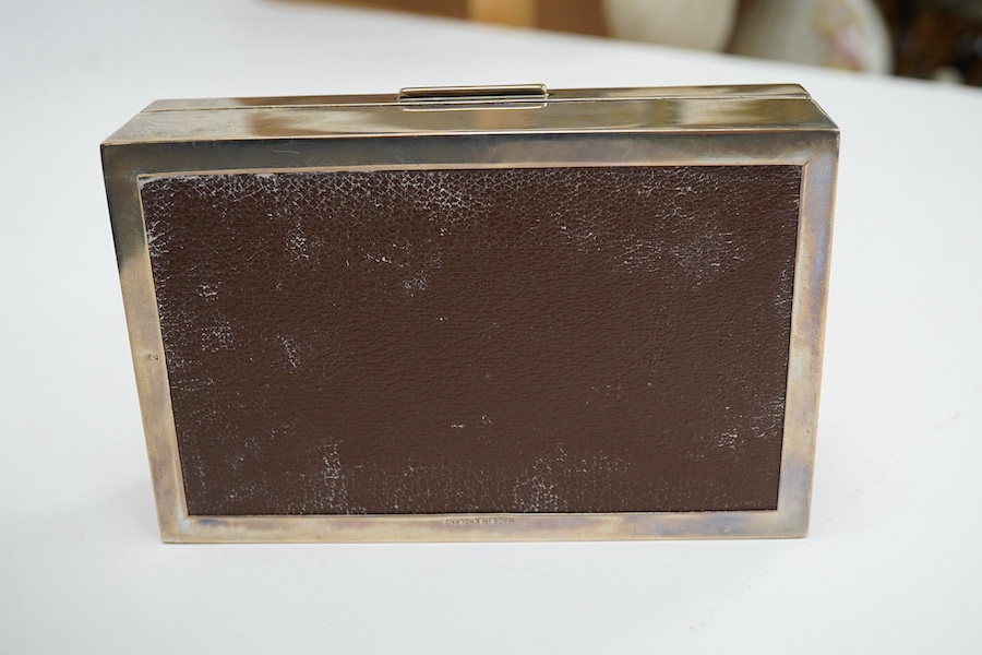 An Elizabeth II part engine turned rectangular silver cigarette box, by Padgett & Braham, Ltd, London 1960, 14cm. Condition - fair to good